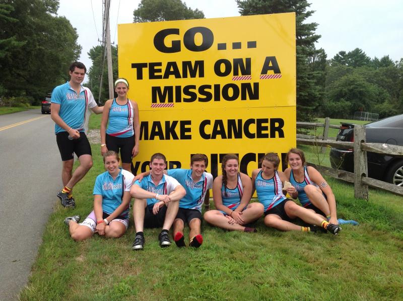 Team oN a Mission stopped at the Marchisio's home on Neck Road where a large group was cheering them on. COURTESY PAULINE O'BRIEN